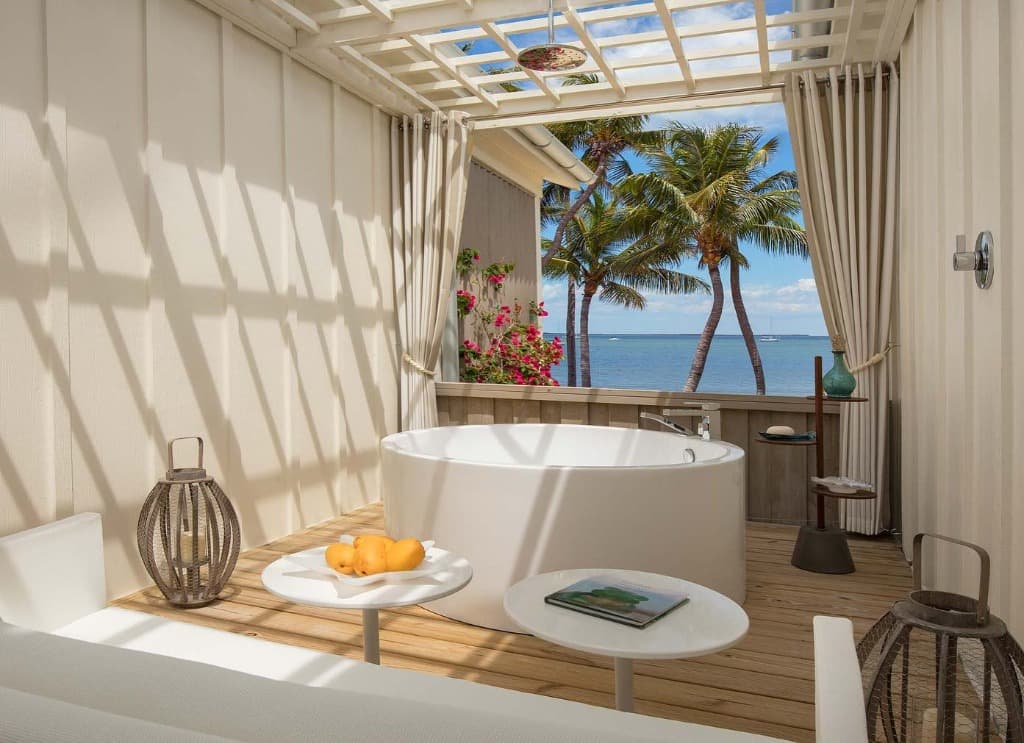 Open-air soaking tub overlooking the bay