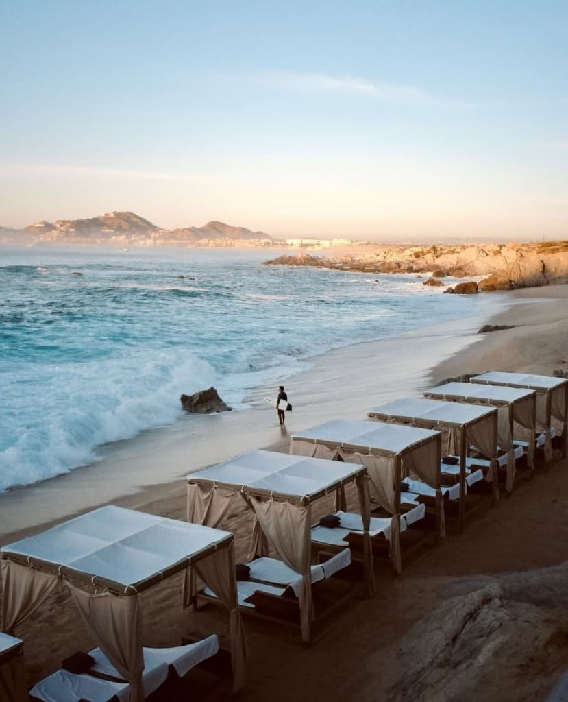 Beach cabanas at sunset with Sea of Cortez waves
